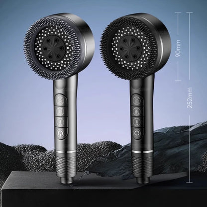 Ellery filtered shower head shown from the side, thumb-button spray controls on the handle